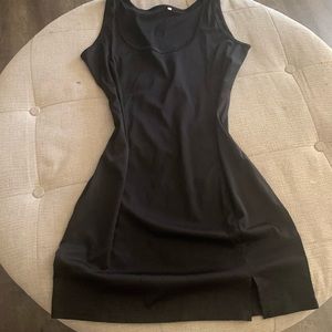 Black mini dress with a small slit on side